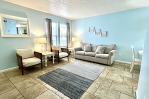 Condo, 1 chambre | Aire de séjour