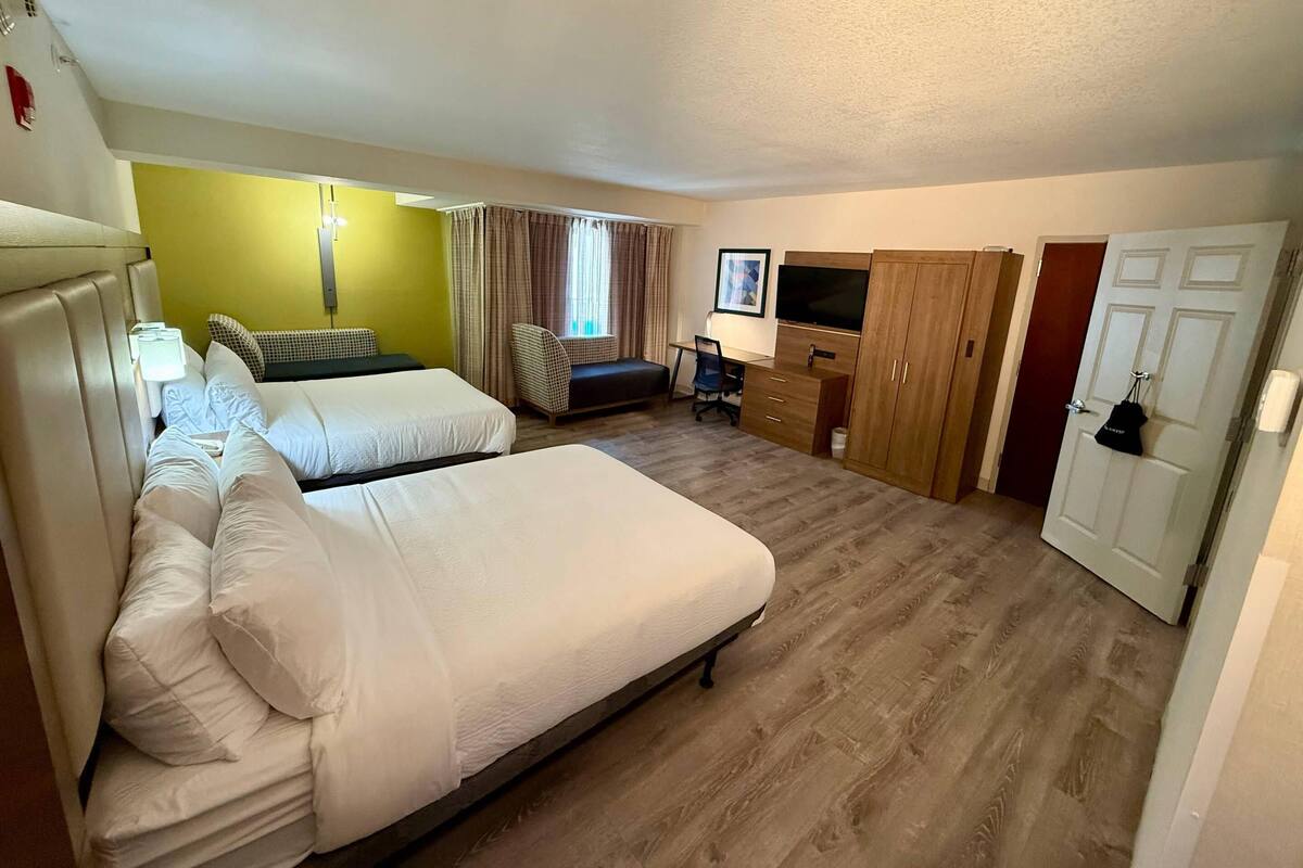Suite, 2 Queen Beds, Mobility Accessible, Non Smoking | Desk, laptop workspace, iron/ironing board, WiFi (free)