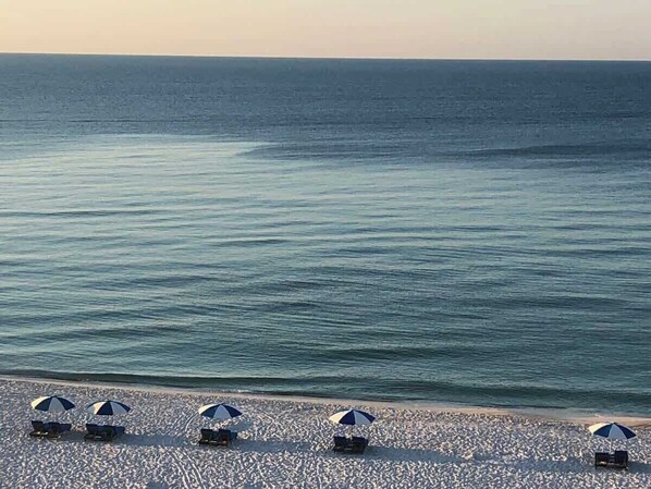 On the beach, sun loungers, beach towels