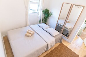 1 bedroom, desk, iron/ironing board, travel cot