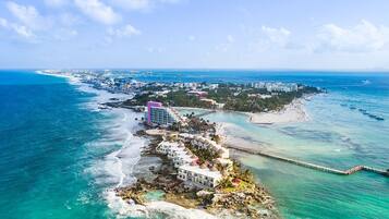 On the beach, sun-loungers, beach towels