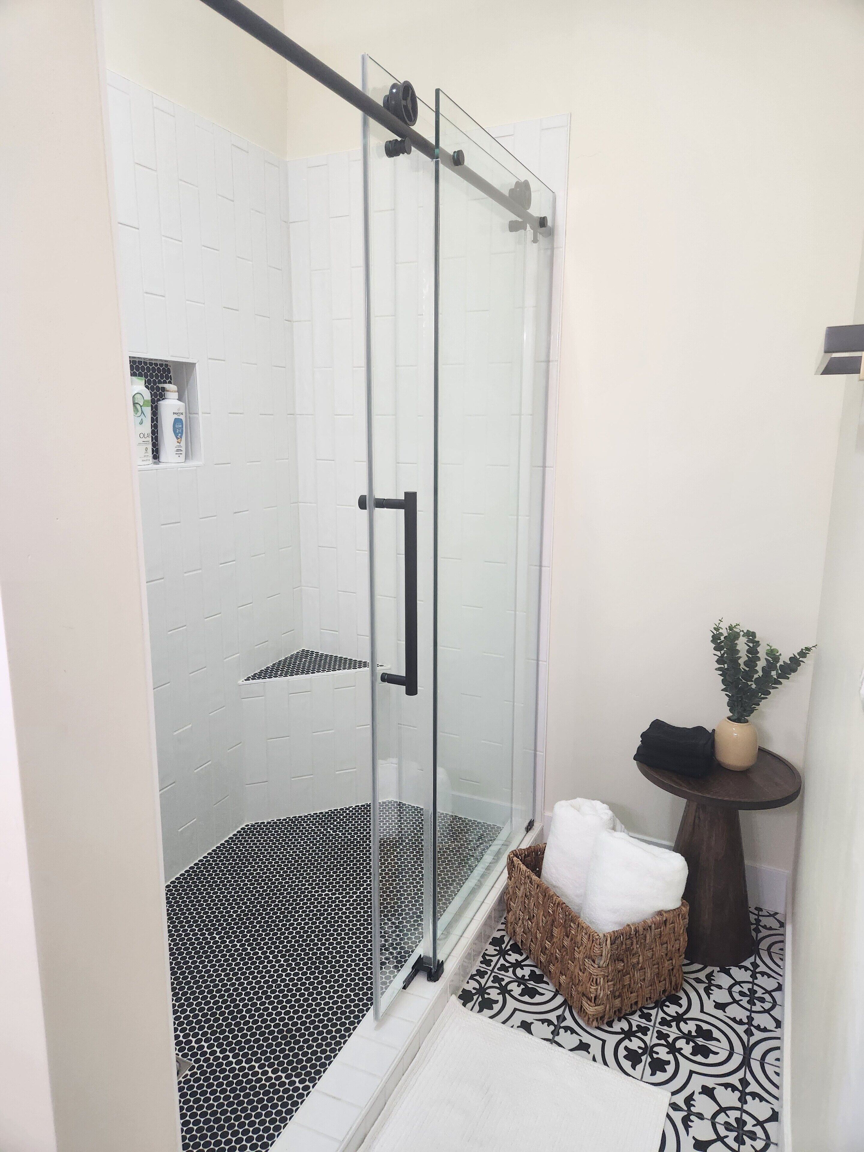Shower, hair dryer, towels, soap