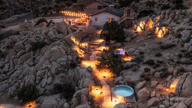 A house with a patio area, a hot tub, and a pool. - Desert Nest: Cozy Retreat Amidst Boulders (Yucca Valley)
