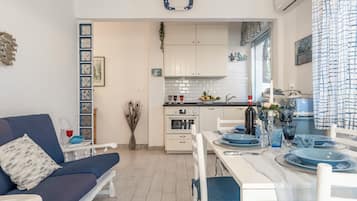 Ferienhaus, Terrasse, Gartenblick | Eigene Küche