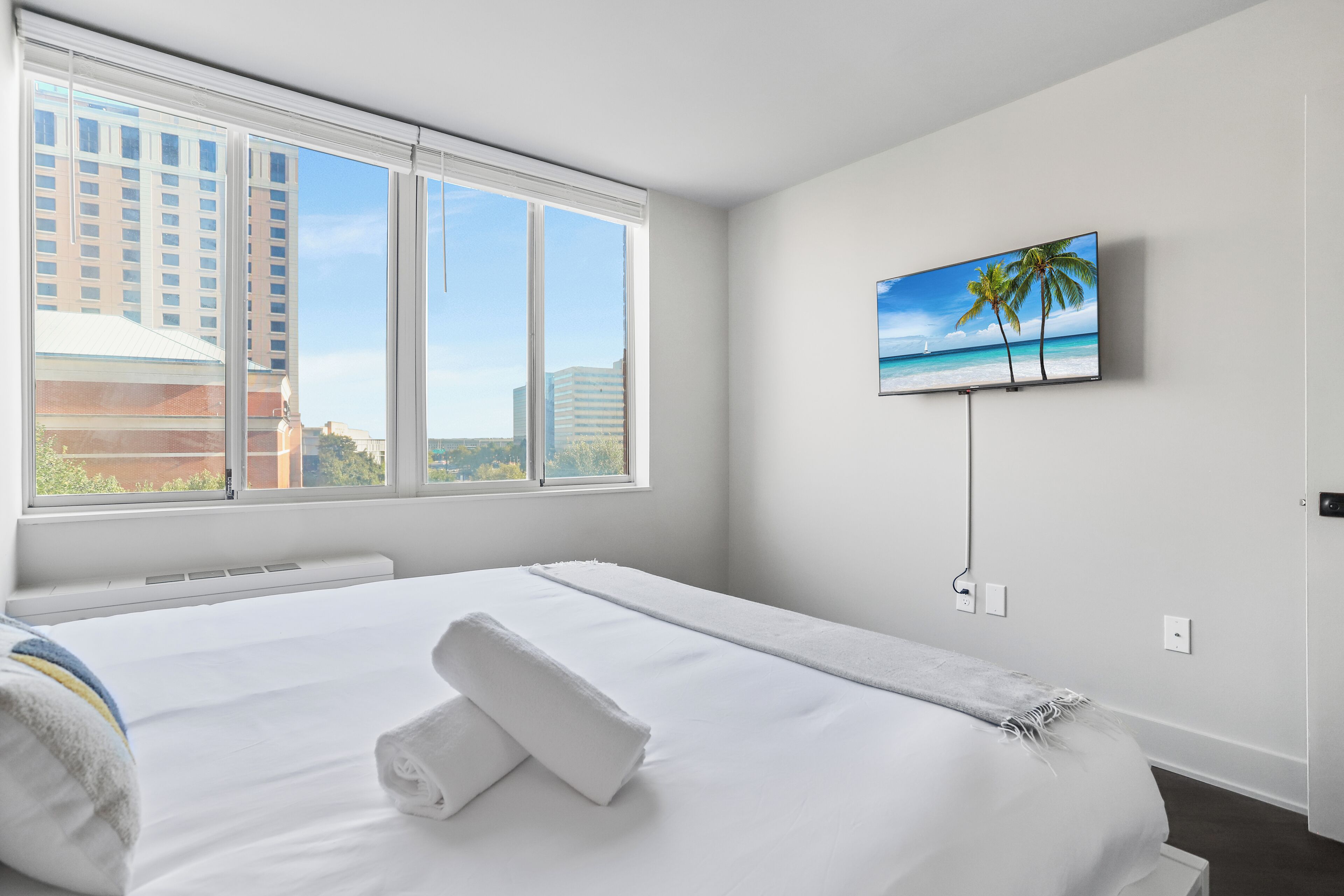 Premium bedding, desk, blackout curtains, iron/ironing board