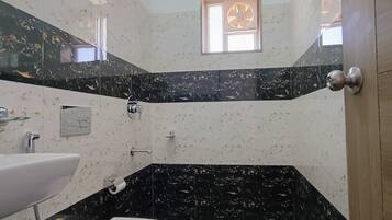Shower, towels, soap, shampoo