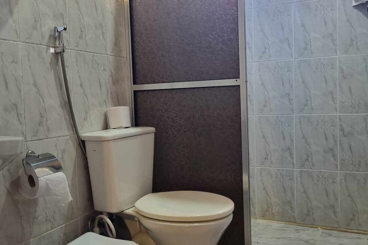 Superior Triple Room, Lanai, Hill View | Bathroom | Shower, towels, soap, toilet paper