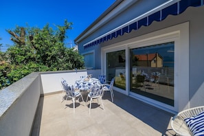 Outdoor dining - Beachfront villa with sea views, 2 bikes, heated private pool - just 300 metres to the beach (Dramalj)
