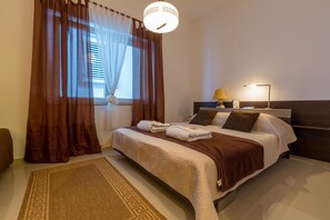 1 camera, una scrivania, Wi-Fi gratuito, lenzuola