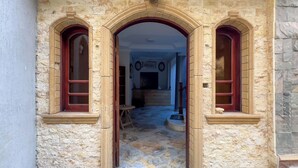 An arched doorway with stone walls and wooden trim. - Pyramids Sunlight Hotel (Giza)