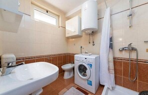 Ducha, secador de pelo, toallas