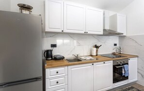 Réfrigérateur, four, plaque de cuisson, lave-vaisselle