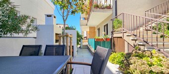 Dog-friendly flat just 600 metres from the beach with barbecue area, private terrace, washing machine