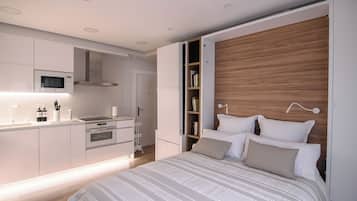 Apartament, 1 dormitori, balcó, vistes a la ciutat | Sala d'estar | Llibres
