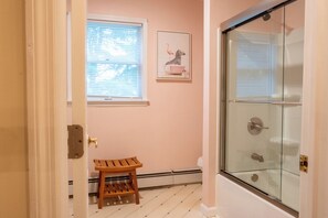Shower, hair dryer, towels, toilet paper