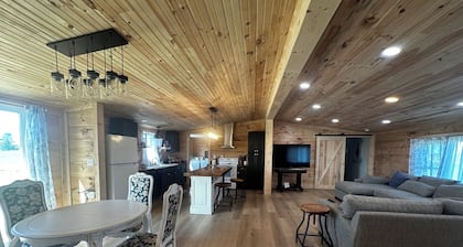 Fly in on a grass runway to a charming 3-bedroom house on a pheasant preserve