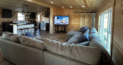 Fly in on a grass runway to a charming 3-bedroom house on a pheasant preserve