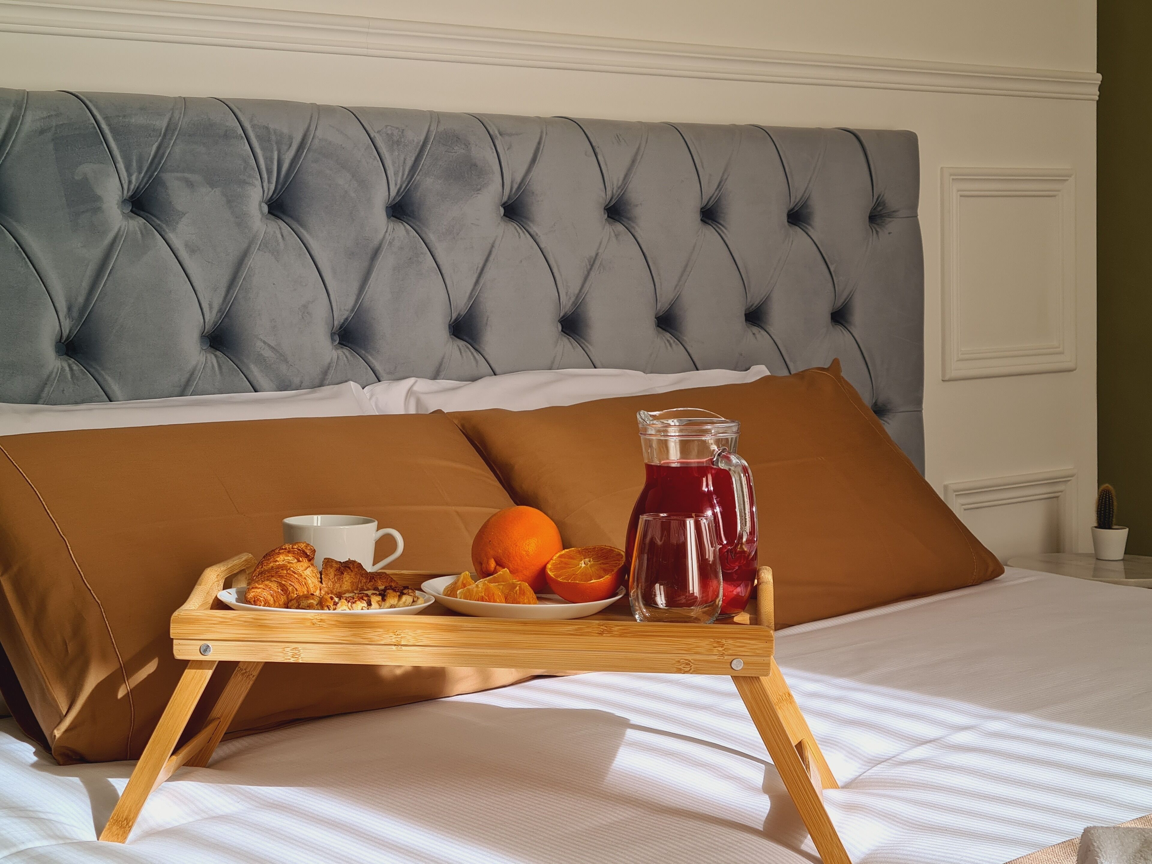 Deluxe Triple Room, Balcony, City View | Blackout drapes, soundproofing, iron/ironing board, free WiFi