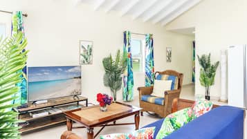 Apartment, 2 Bedrooms, Balcony, Lagoon View | Living area | Flat-screen TV