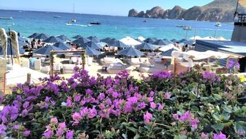 Private beach, white sand, beach cabanas, sun loungers