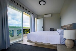 King Bed Scenic View - Room 2 | Premium bedding, pillow-top beds, individually decorated - Club Vieques - Adults Only Resort - LGBT Friendly (Vieques)
