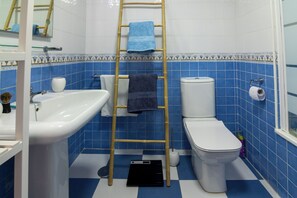 Hair dryer, bidet, towels, soap