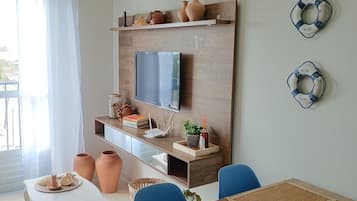 Premium Apartment, Pool Access, Beach View | Living area | 32-inch Smart TV with digital channels, Netflix, pay films