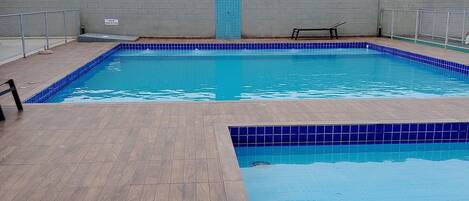 Premium Apartment, Pool Access, Beach View | Pool | Outdoor pool, sun loungers