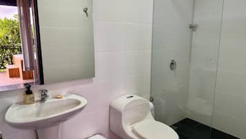 Shower, jetted bath, towels, soap