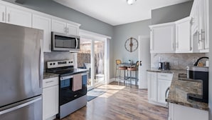 Coffee/tea maker, fridge, microwave, oven