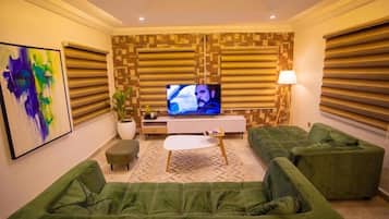 Family Apartment, Balcony, City View | Living area