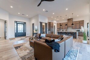 Smart TV, fireplace, foosball, books