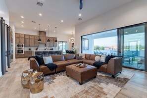 Smart TV, fireplace, foosball, books