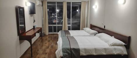 Laptop workspace, free WiFi, bed sheets