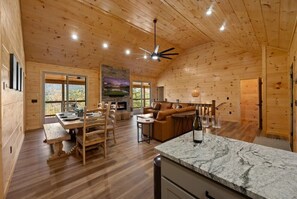 Smart TV, fireplace, table football, books