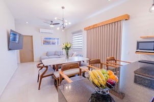 Deluxe Apartment, 2 Bedrooms | Living area | Smart TV