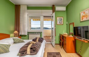 1 habitación, tabla de planchar con plancha, wifi gratis y ropa de cama 