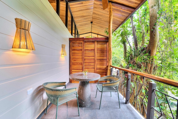 Deluxe Triple Room, Garden View | Living area | 55-inch Smart TV with digital channels, Netflix, streaming services