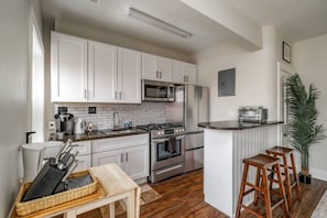 Fridge, microwave, coffee/tea maker, toaster