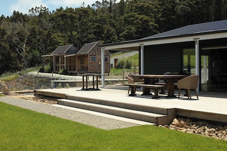 Outdoor dining. Farmstay getaway in a subtropical paradise - Cabin 1 of 2