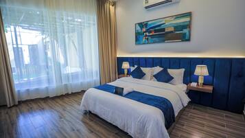 Deluxe villa, patio, uitzicht op zwembad