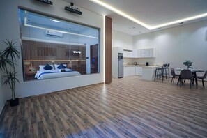 Deluxe chalet, patio, uitzicht op tuin | Woonruimte