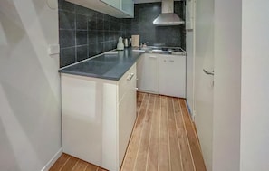 Fridge, stovetop, coffee/tea maker, cookware/dishes/utensils