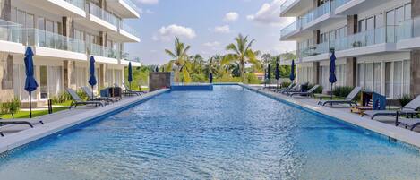 2 outdoor pools, open 9:00 AM to 10:00 PM, sun loungers