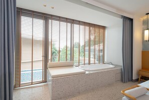 Deluxe Room, 1 King Bed, Pool Access | In-room safe, iron/ironing board, bed sheets
