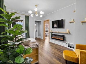 Smart TV, fireplace, books