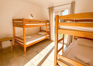 4 bedrooms, iron/ironing board, travel cot, WiFi