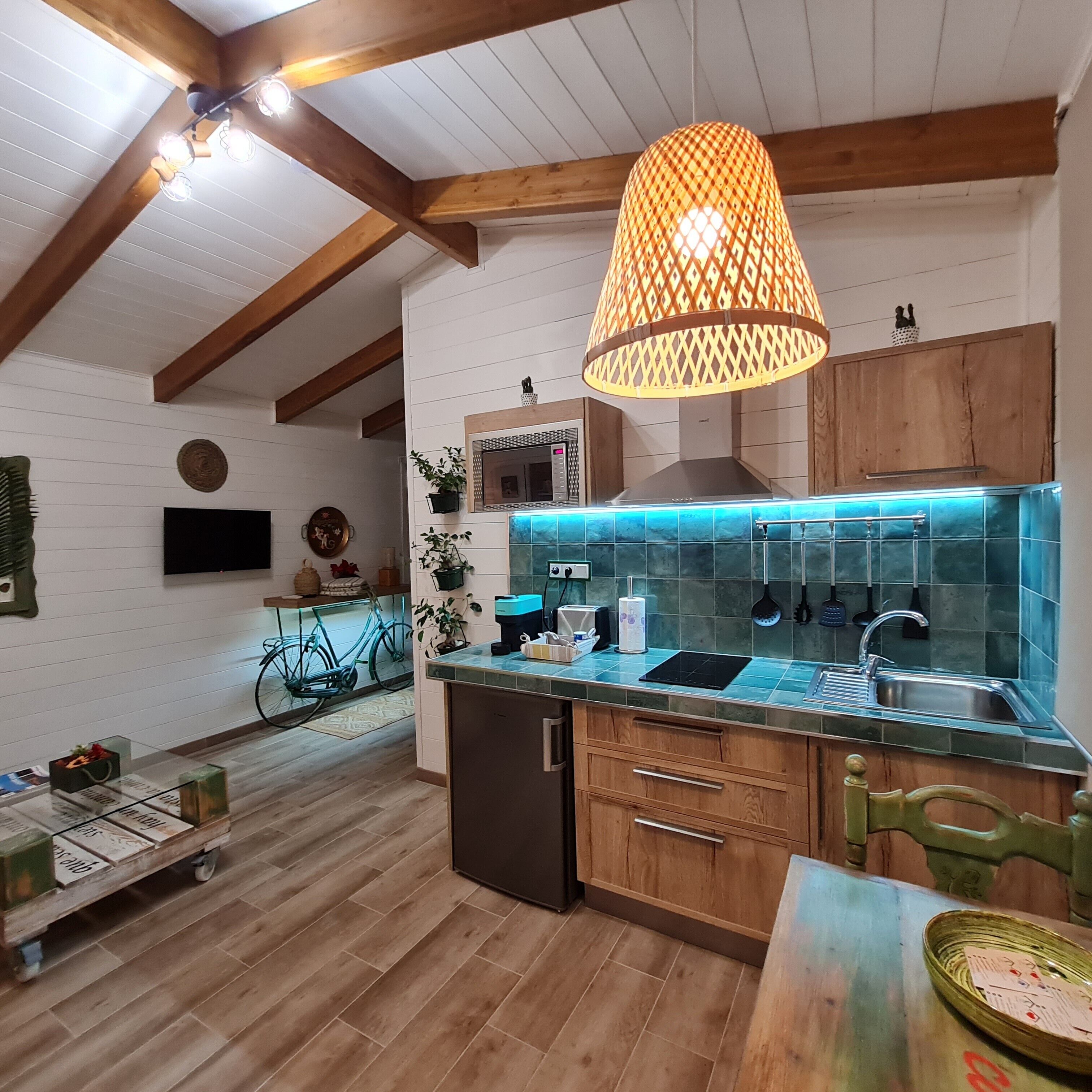 Fridge, microwave, stovetop, coffee/tea maker