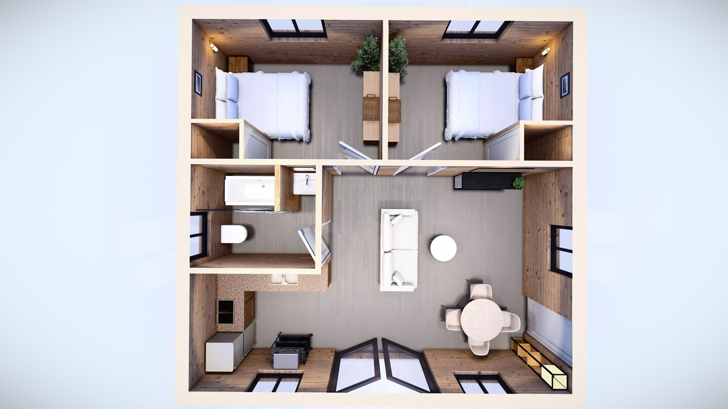 En moderne og kompakt hotellægning med to soveværelser, et badeværelse, et spiseområde og et lille køkken.
