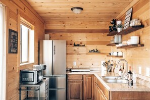 Fridge, microwave, stovetop, coffee/tea maker